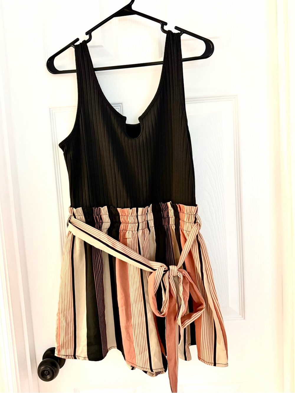 Women’s Casual Black Top with Striped Peach & Cream Skirted Romper Bottom